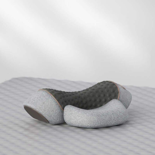Gray and brown Electric Neck Massage Pillow on a striped surface