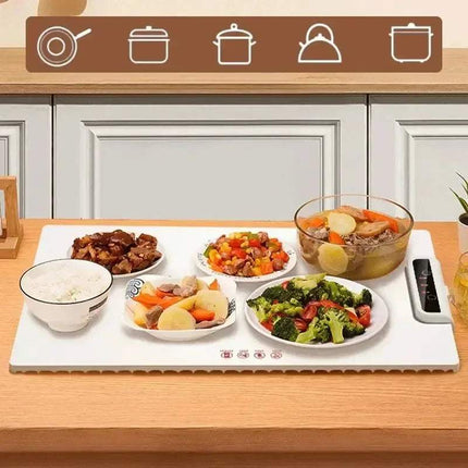 Foldable Food Heating Mat with various dishes like rice, meat, and vegetables on a table, keeping meals warm and ready. - Astoria Lifestyle