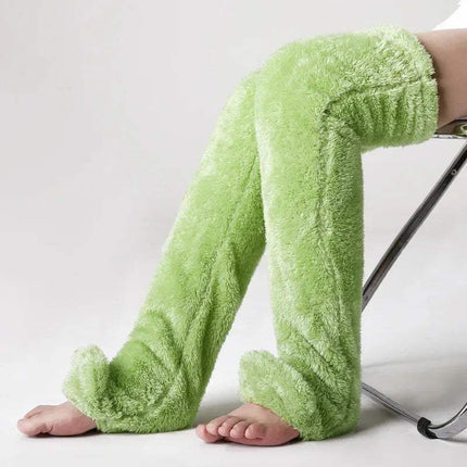 Green Fuzzy Leg Warmer Stockings worn by a person on a white background
