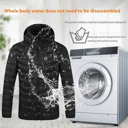 Black Heated Jacket with water splashes next to a washing machine, indicating water resistance feature. Astoria Lifestyle