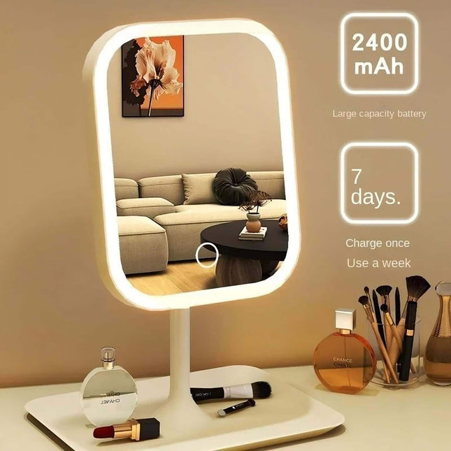 LED Makeup Mirror on a table with cosmetic items, battery information displayed.
