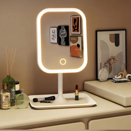 LED Makeup Mirror with various items including a bottle, a diffuser, and a lipstick.