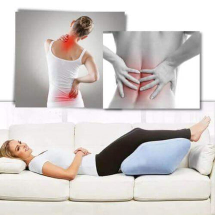 Woman lying on a couch with Leg Elevation Pillow for Better Circulation & Comfort