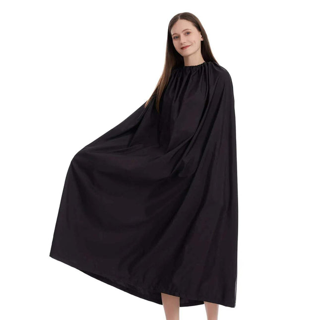 Woman wearing a black Portable Beach Changing Cover for Quick & Private Changing