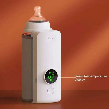 Portable Infant Bottle Warmer Temperature monitor with a digital display on an orange background