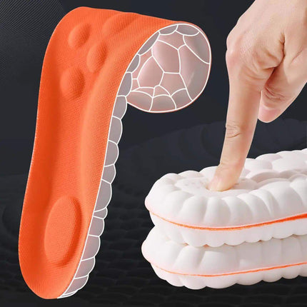 Shock Absorbing Shoe Inserts orange with a hand pointing to it, showing detailed texture.
