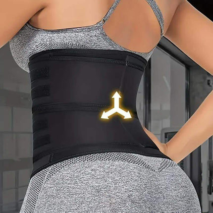 Person wearing Waist Belt Body Shaper with a logo, standing in a blurred indoor setting.