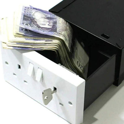 Wall Socket Safe with British pounds being counted