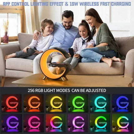 Family sitting on a couch with Wireless Charging Bluetooth Lamp, adjustable RGB light on a table in front of them. Astoria Lifestyle