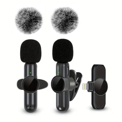 Wireless Lavalier Microphone. Two microphones with windshields and a smartphone clip on a white background