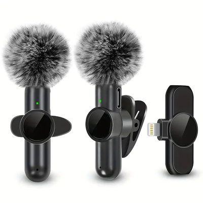 Wireless Lavalier Microphone. Two microphone windshields with a clip and a smartphone clip on a white background