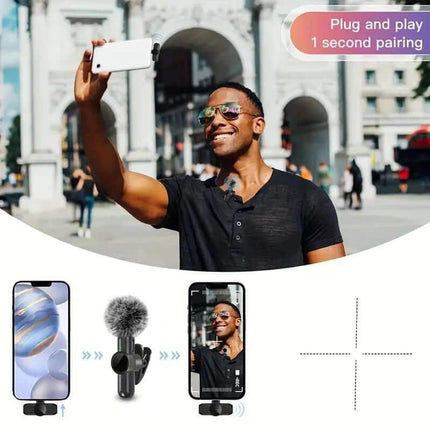 Wireless Lavalier Microphone. Man taking a selfie with a smartphone in an urban setting, featuring a microphone and phone stand.