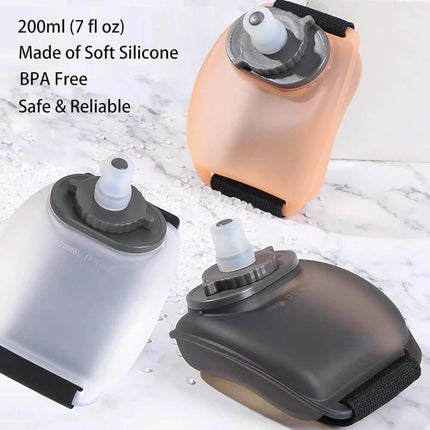 Wrist Water Bottle. Three flexible silicone water bottles in different colors on a marble surface.