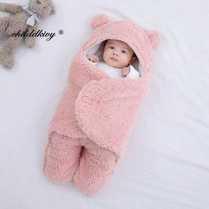 Baby wrapped in a pink Baby Wrap Blankets Swaddle Cozy, Gentle, and Multi-Functional with bear ears on a white background, with 'childlike' brand visible.