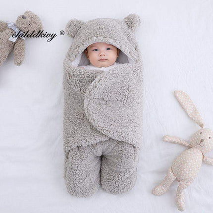 Baby wrapped in a Baby Wrap Blankets Swaddle Cozy, Gentle, and Multi-Functional with toys on a white background