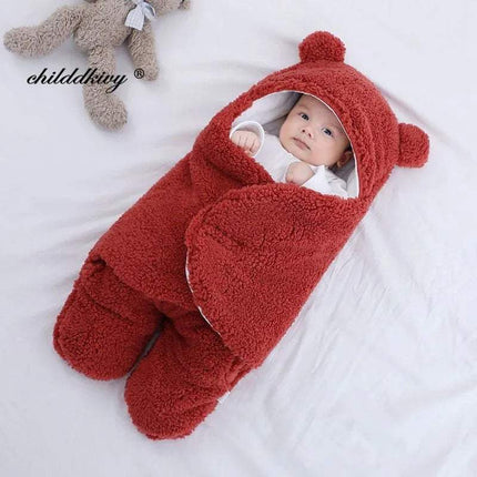 Baby in a red Baby Wrap Blankets Swaddle Cozy, Gentle, and Multi-Functional with a teddy bear toy on a white background, featuring the brand 'childlike'.