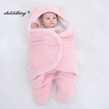 Baby wrapped in a pink Baby Wrap Blankets Swaddle Cozy, Gentle, and Multi-Functional on a light gray background