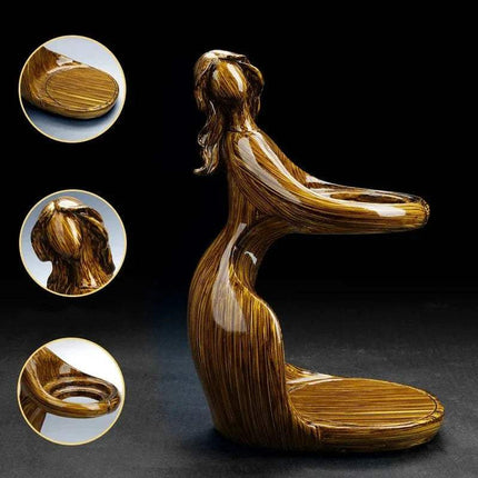 Semi-Automatic Teapot Elegant ceramic sculpture depicting a graceful figure, perfect for home decor and artistic displays.