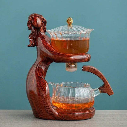 Semi-Automatic Teapot featuring an elegant design with a glass teapot and a creative wooden holder.