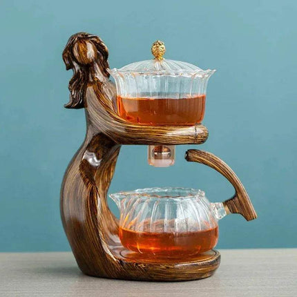 Semi-Automatic Teapot featuring a unique design for effortless brewing and an elegant tea experience.