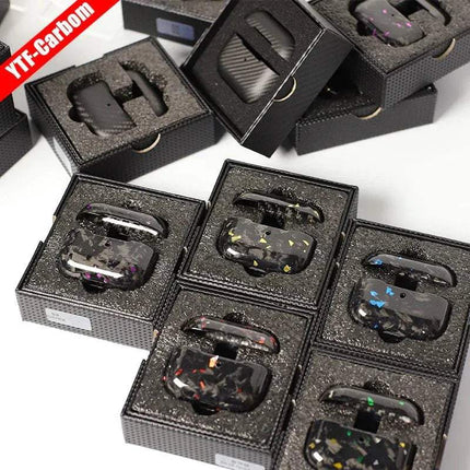 Multiple black Carbon Fiber Case for AirPods Pro in packaging with a brand label in the corner.
