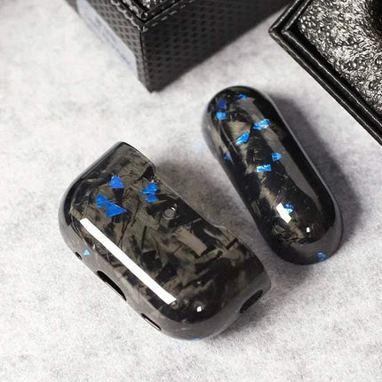 Black Carbon Fiber Case for AirPods Pro with blue accents on a light gray surface