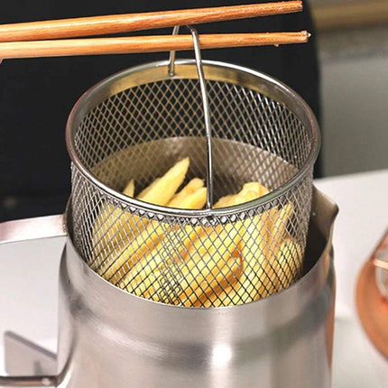 Stainless Steel Frying Pot Even & Crispy Frying Made Easy with strainer basket lifting perfectly cooked fries for deep frying at home or outdoors.
