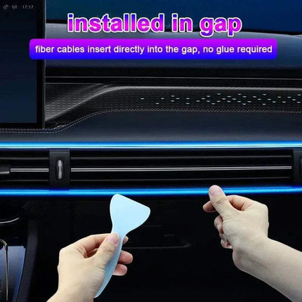 Installation of fiber RGB Car Interior Ambient LED Light Strip into a car's air vent gap without glue.