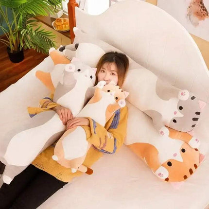 Person lying on a couch with  Long Cat Pillow