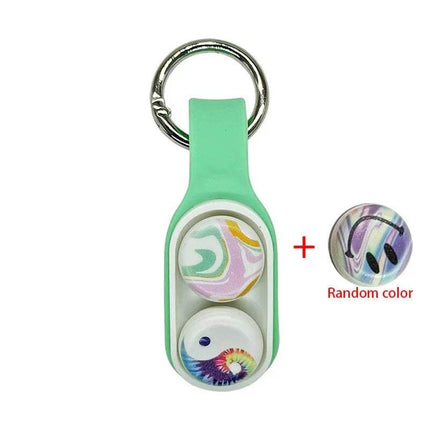 green PopPuck Hand Spinner Magnetic Anti-Stress Fidget Toy Fun & Focus with keychain attachment on a white background