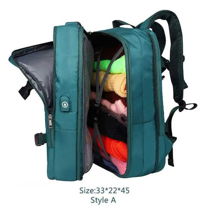 Peacock green Extendible Travel Backpack Unisex with colorful items inside on a white background