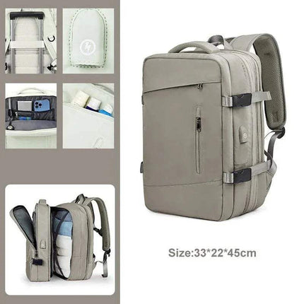 Gray Extendible Travel Backpack Unisex with multiple compartments and a size label on a white background