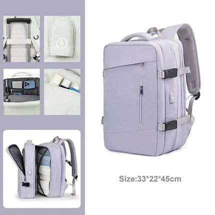 Purple Extendible Travel Backpack Unisex with multiple compartments and a size label on a white background