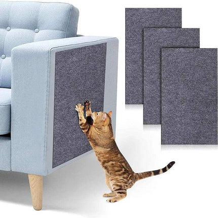 A cat scratching a Cat Anti Scratch Mat on furniture, protecting the chair from claw damage.