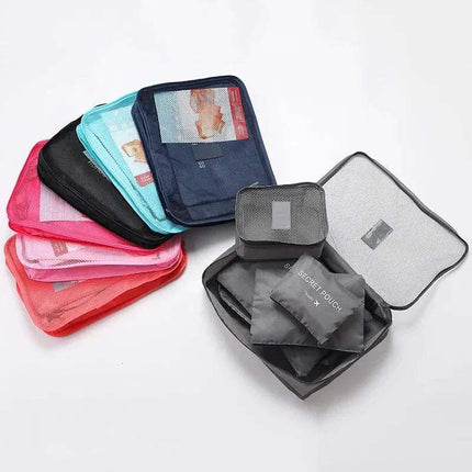 Set of colorful 6Pcs Travel Clothes Storage Bags with a clear mesh pouch on a white background