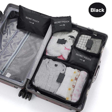 Black 6Pcs Travel Clothes Storage Bags with 'Secret Pouch' labels inside an open suitcase on a white background.