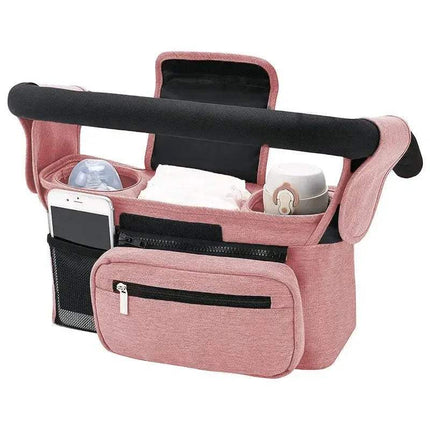 Pink Baby Stroller Organizer Convenient Storage for Parents on the Go with black accents holding a phone, bottle, and other items on a white background