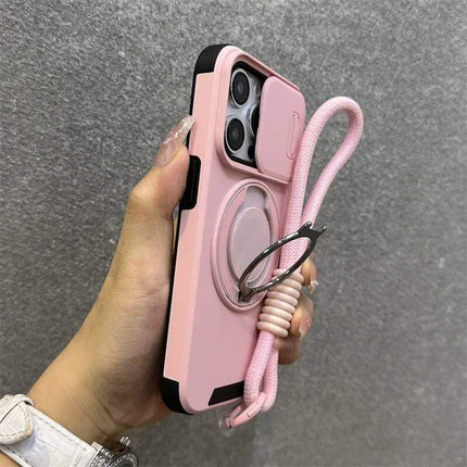 Hand holding a pink Armor Magnetic Bracket iPhone Case with a strap against a gray background