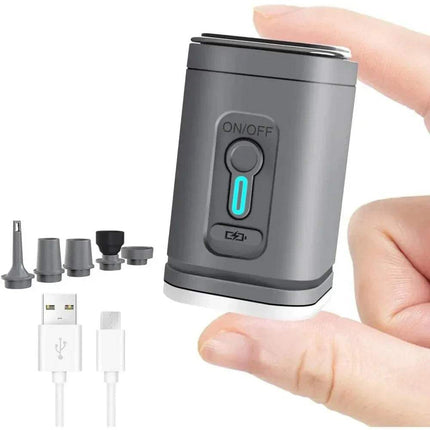 Portable Mini Electric Air Pump with attachments and USB cable on a white background