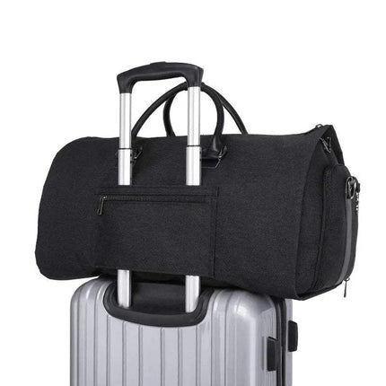 Black Multifunctional Foldable Suit Bag Convertible Travel Duffel Wrinkle-Free Travel attached to a silver suitcase on a white background