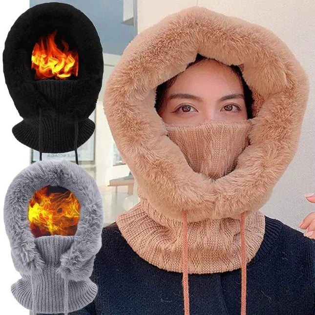 Person wearing a khaki Thicken Knitted Fleece One-Piece Winter Scarf Mask for Women showcasing warm-flame-like felling in mittens, against a blurred indoor background.