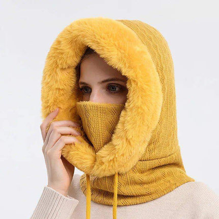 Person wearing a yellow Thicken Knitted Fleece One-Piece Winter Scarf Mask for Women on a light gray background