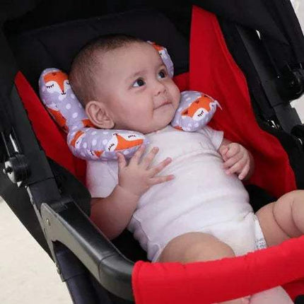 Baby in a stroller with a fox-patterned Baby Travel Pillow Safe, Comfortable Head & Neck Support