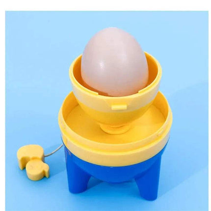 Yellow and blue Egg Yolk Shaker Mixer Spinner Perfectly Blend Eggs in Seconds with an egg on a light blue background