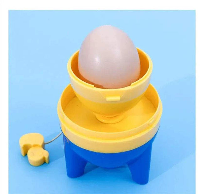 Yellow and blue Egg Yolk Shaker Mixer Spinner Perfectly Blend Eggs in Seconds with an egg on a light blue background
