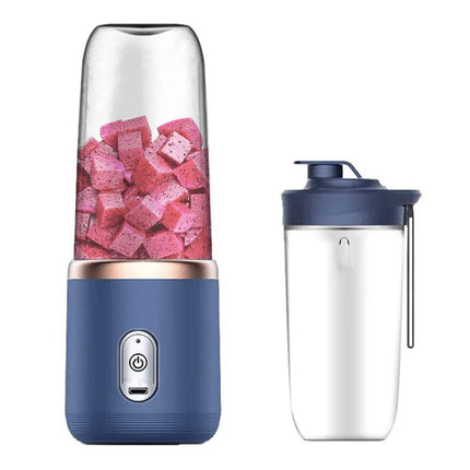 Portable Electric Juicer Cup  with a clear container filled with pink fruit cubes on a white background