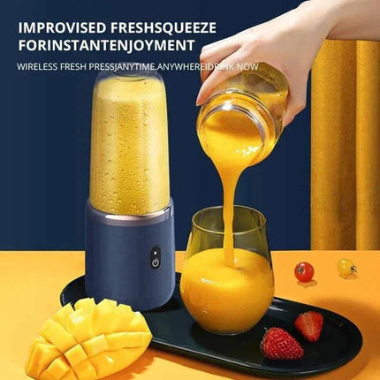 Hand pouring juice from a Portable Electric Juicer Cup into a glass with mango and strawberry on a yellow surface.