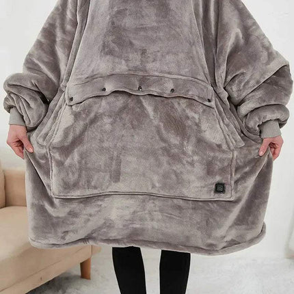 Person wearing a gray fleece Oversized Heatable Hoodie on  a white background