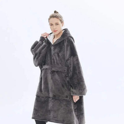 Person wearing a dark gray Oversized Heatable Hoodie on a white background