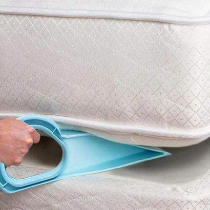 Person using an Ergonomic Mattress Wedges to check the firmness of a mattress.
